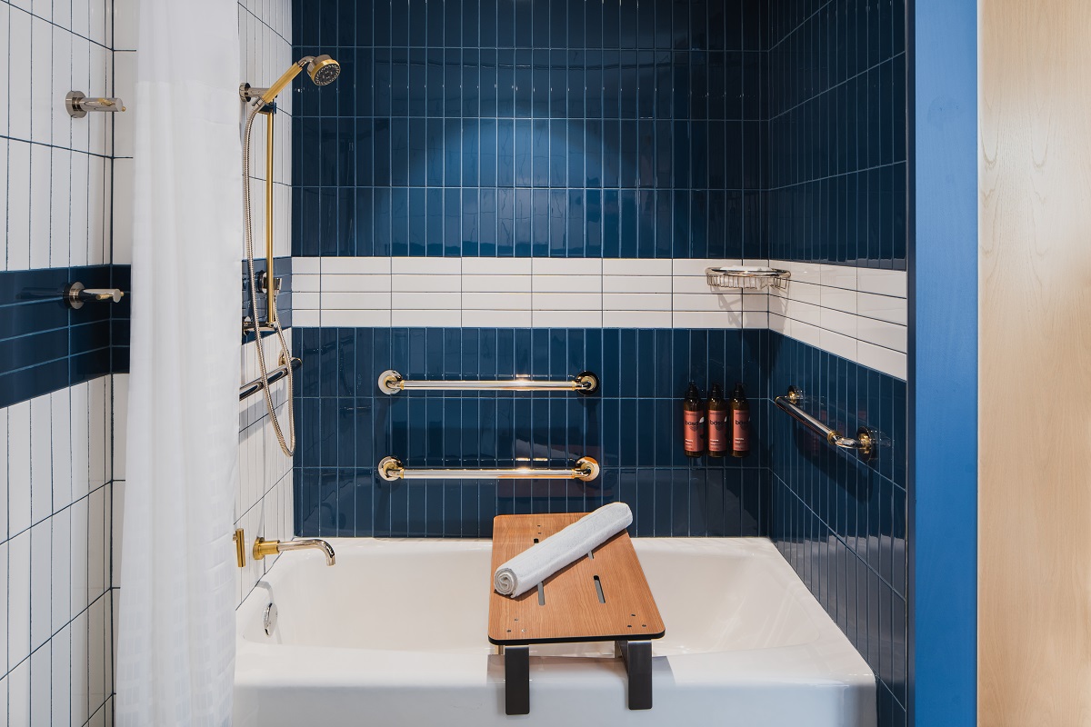 Intense blue and white colors in the bathroom of the Motto by Hilton in New York