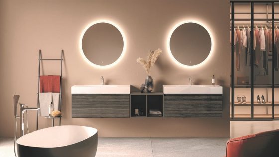 freestanding bath and backlit mirrors in bathroom design by RAK ceramics