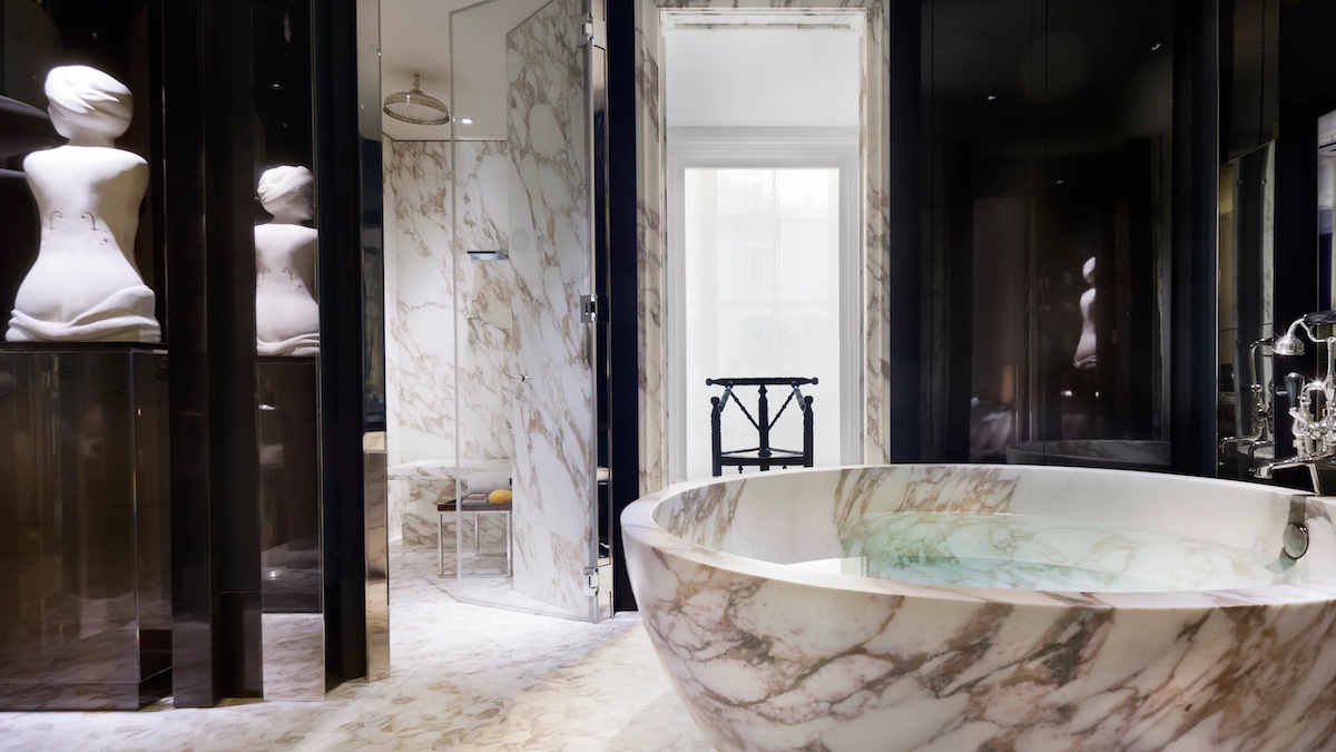 A large bathroom, featuring marble, and luxury finishes - Rosewood London