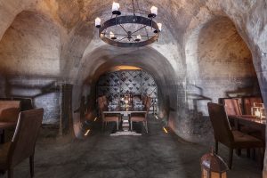 the secret wine cave at hotel Mystique Santorini