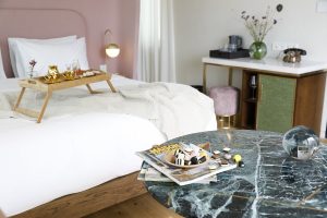 signature pink velvet headboards decorate the guestrooms