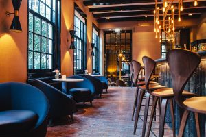 cobbled floor, contemporary seating and statement lighting mix old and new in the brasserie 