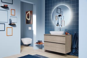 blue bathroom with orange highlights showcasing D-Neo by Duravit