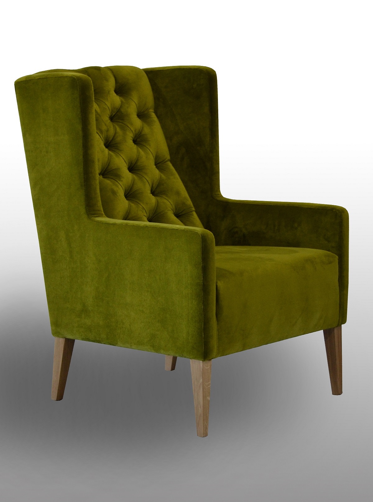 moss green deep buttoned chair by O'Donnell Design