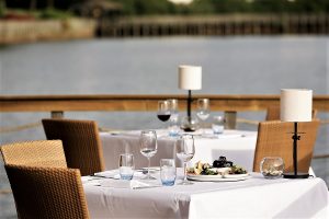 al fresco dining with a view over the lake 