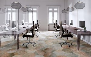 hexagon shaped carpet tiles in muted colours create a unique pattern in a workspace