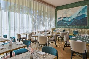 shades of blue in the dining area in St Regis San Francisco with art 