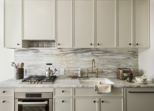 bespoke kitchen design with marble surfaces and brass finishes in rooms at the Pinch in Charleston