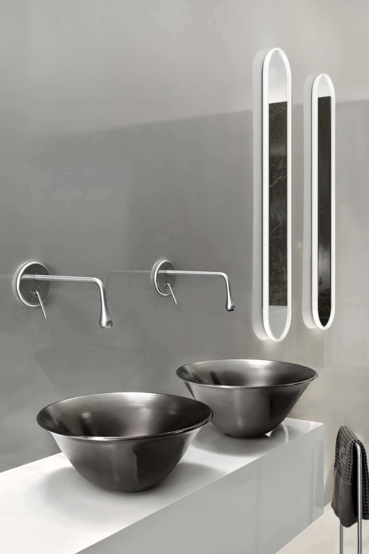 curved flowing design of goccia fittings by gessi
