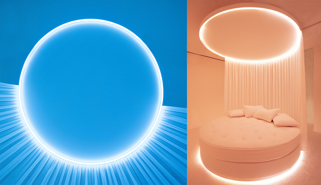 Circular light above bed in blue and orange