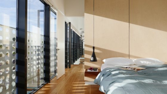 A clean, contemporary guestroom above a city