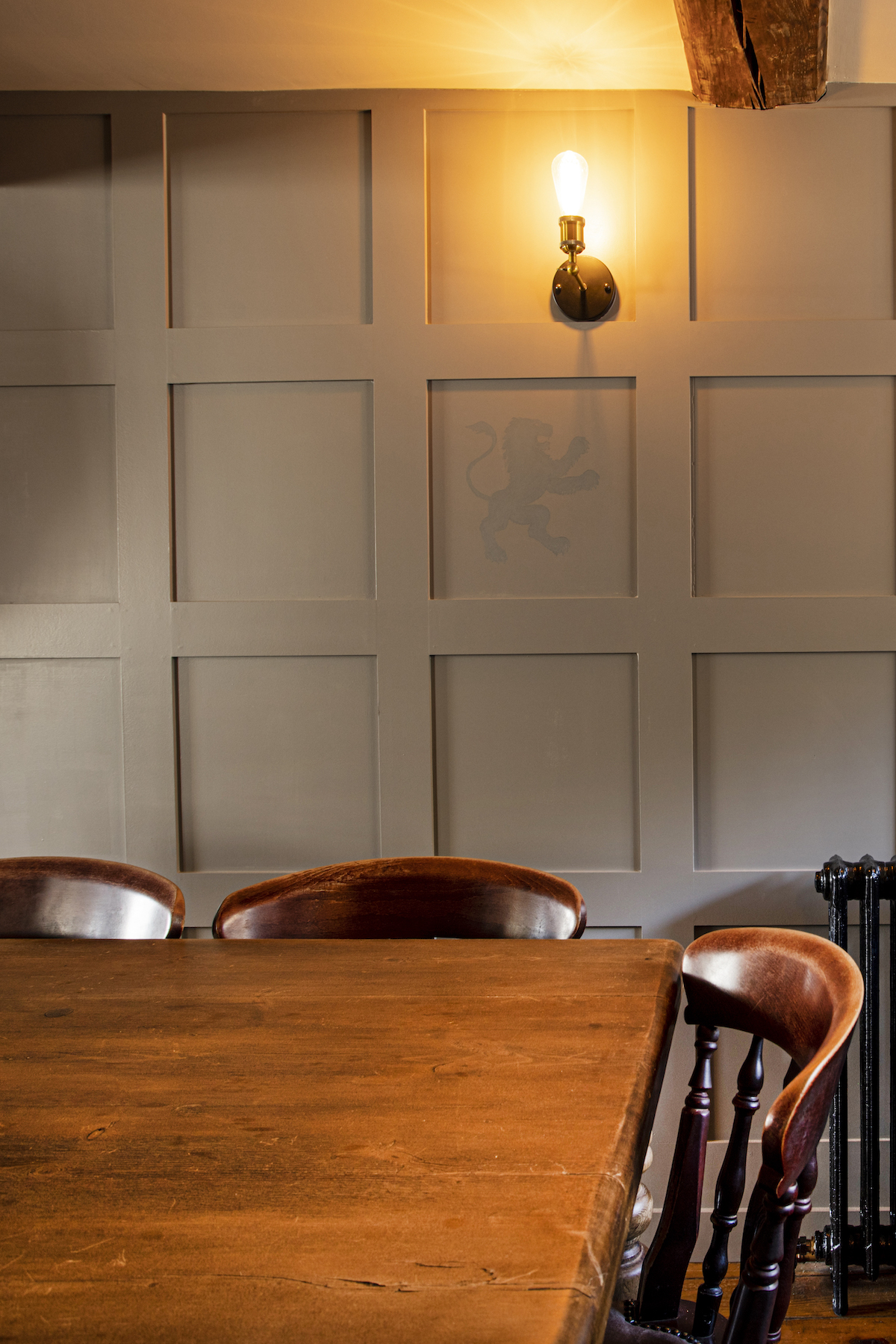 A panelled wall in dining room