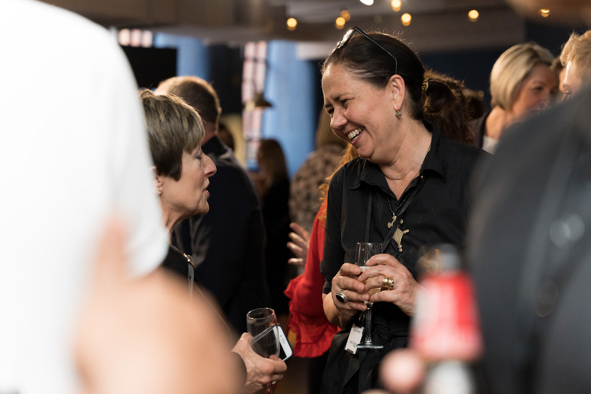 Pauline Brettell laughing with woman at MEET UP North