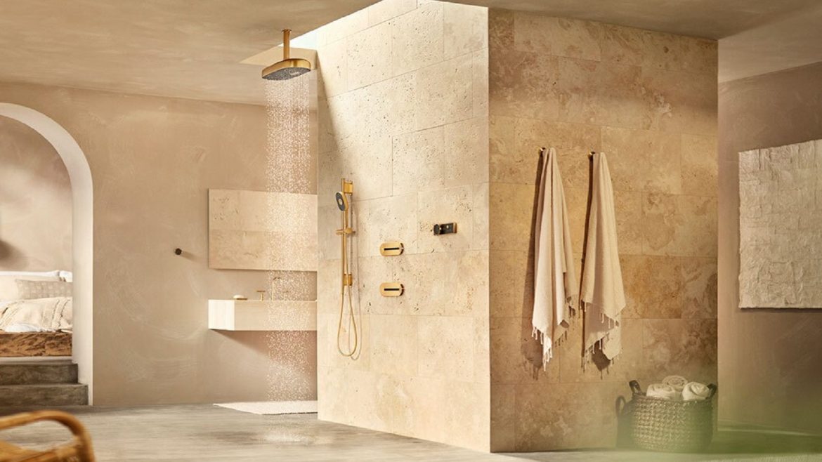 ensuite bathroom in natural stone with Kohler Statement shower