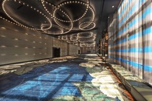 rings of statement lighting and floral surfaces in WElement in Philadelphia