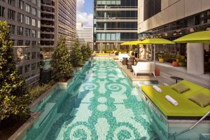 Swimming pool on top deck with parterre garden style tiles
