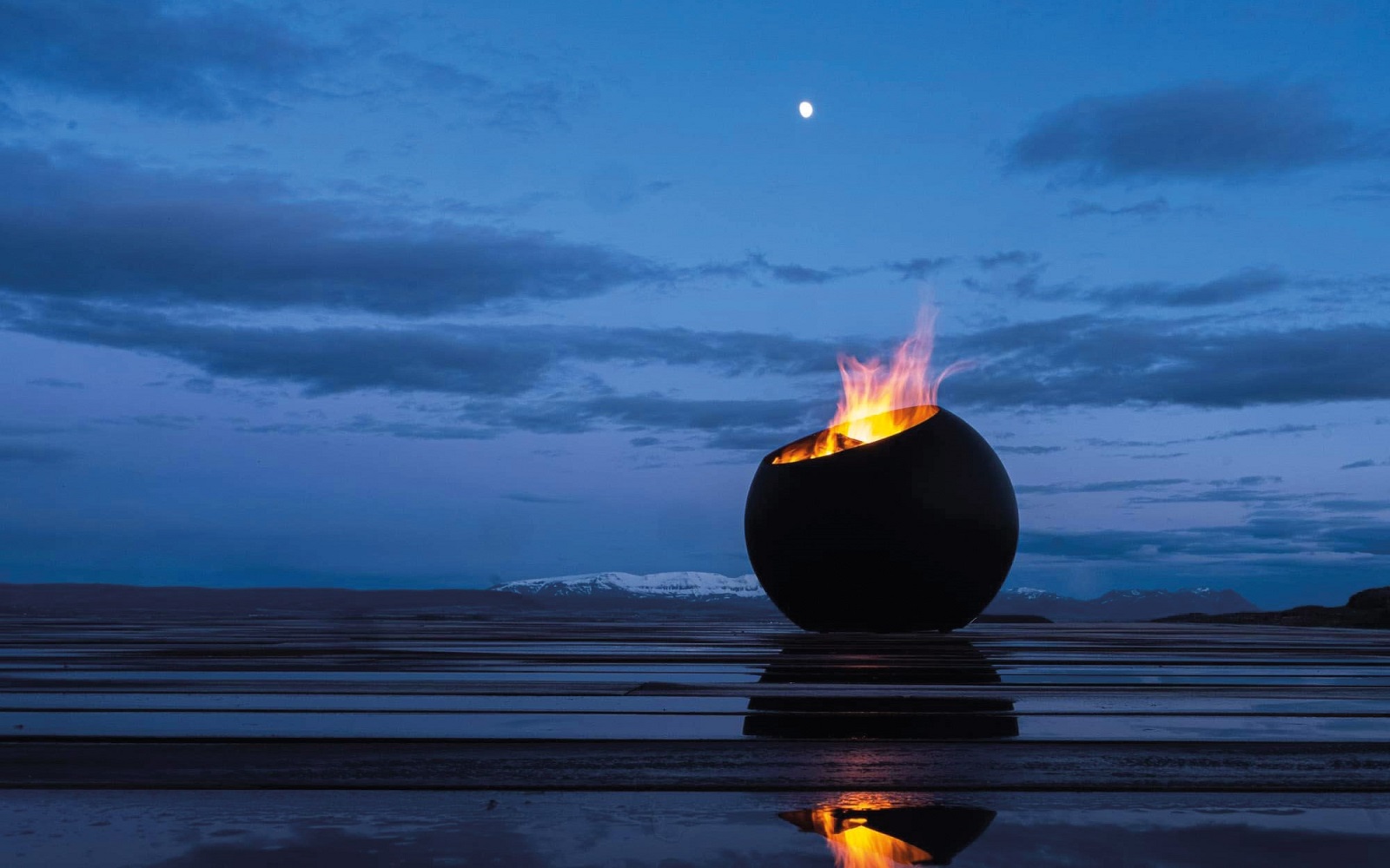 bubble wood burning outdoor fire designed by Focus