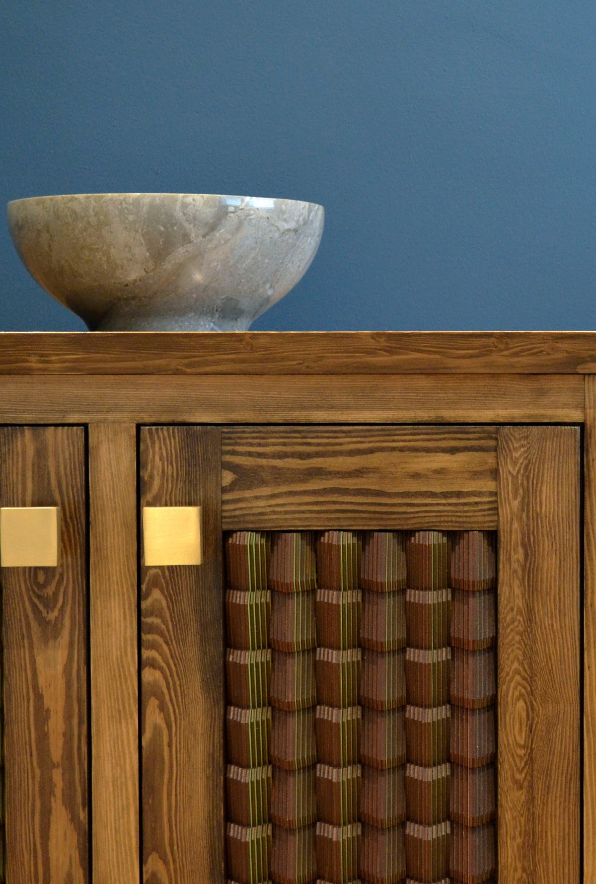 wooden credenza with surface detail by designer Emily Hatton