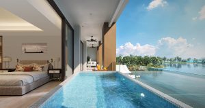 bedroom with view over infinity pool and the lagoon at Angsana Oceanview Residences