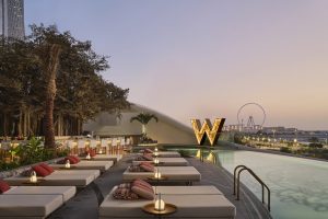 sunset on the pool deck at W Dubai - Mina Seyahi designed by BLINK