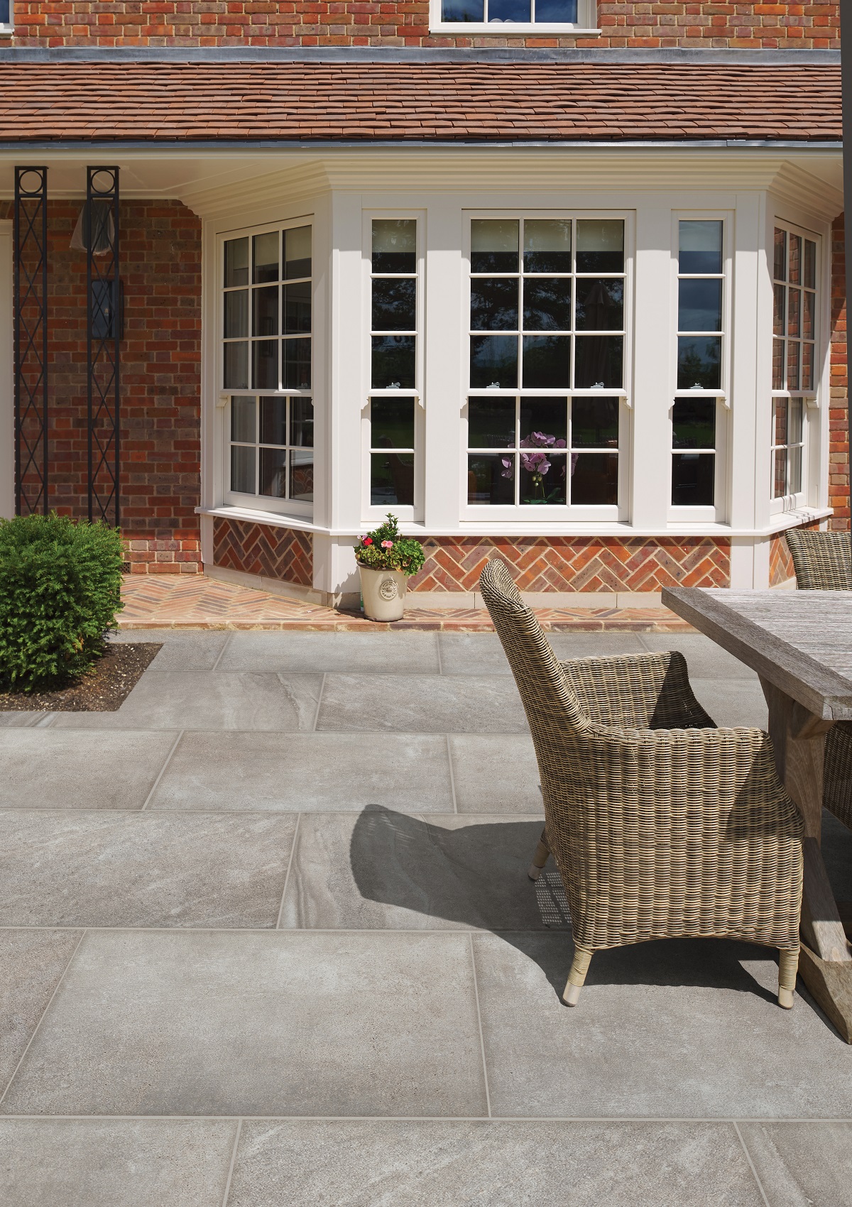 Large Blenheim Porcelain Textured tile extend the living area for outdoor seating