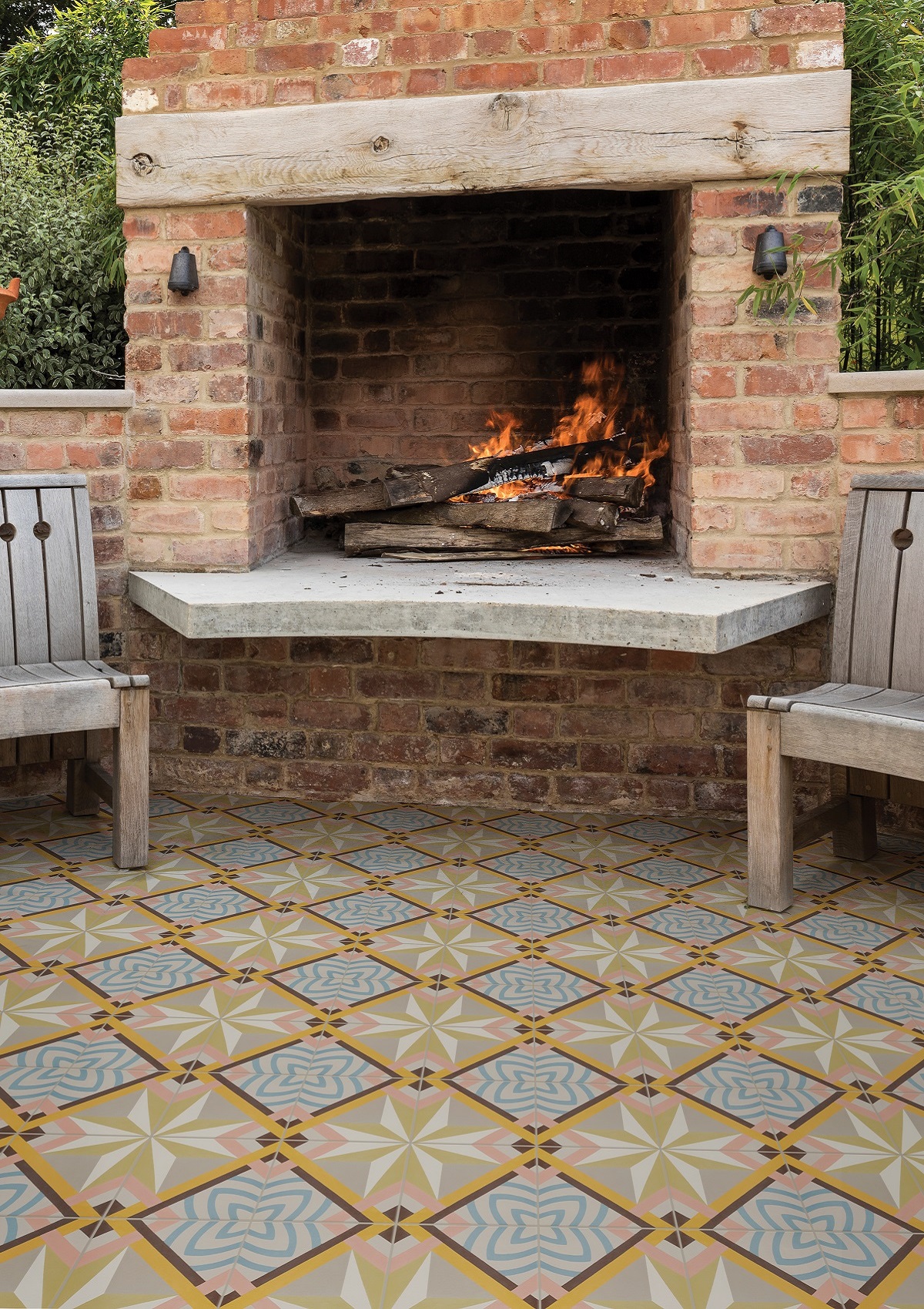 patterned Cabana tiles by Hyperion Tiles surround the barbecue