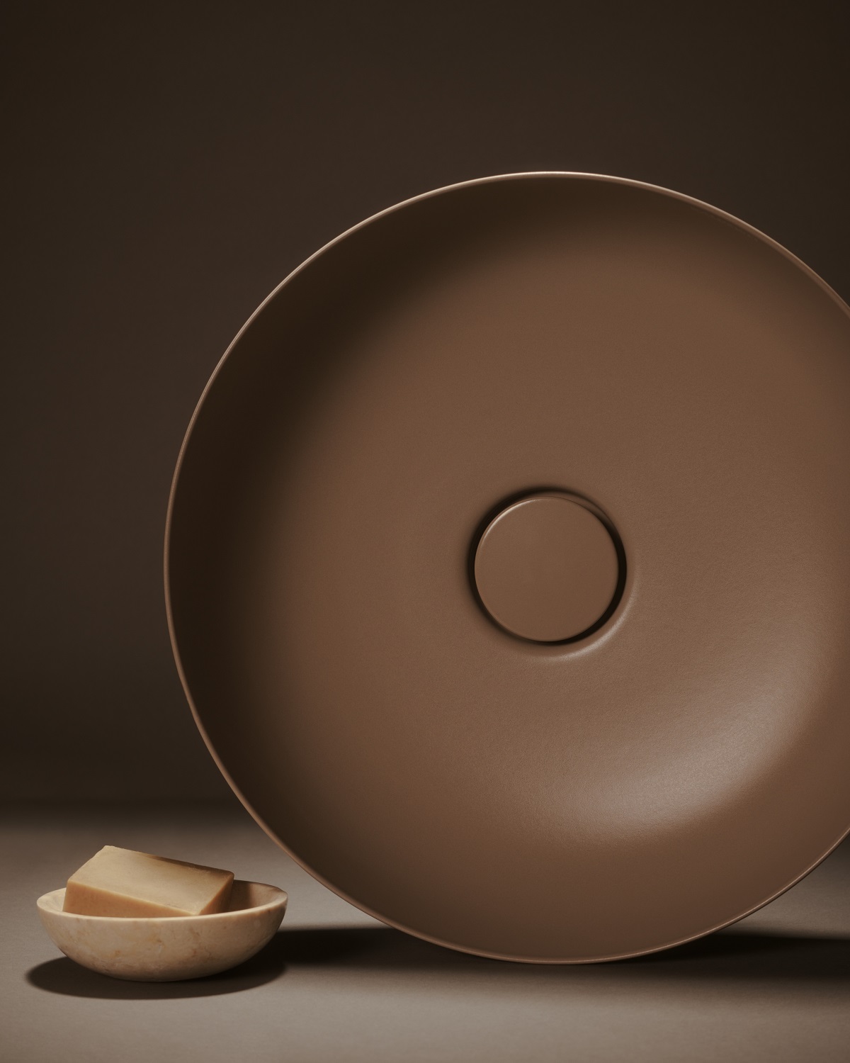 view from above of round earth coloured basin for Kaldewei by Cristina Celestino