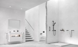 contemporary white bathroom with black taps and shower by KEUCO