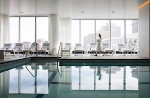 spa and pool with city views