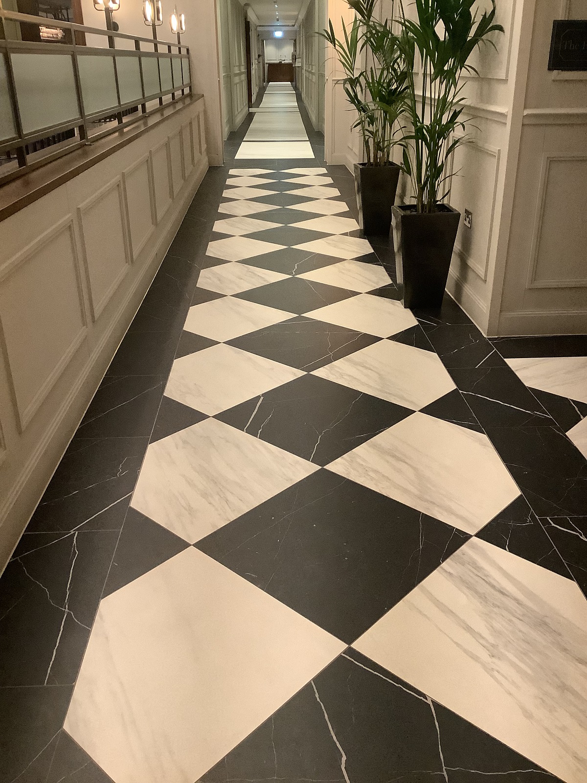 Black and white Victorian-inspired tiles pay homage to the heritage of the surrounding area in this cardiff hotel