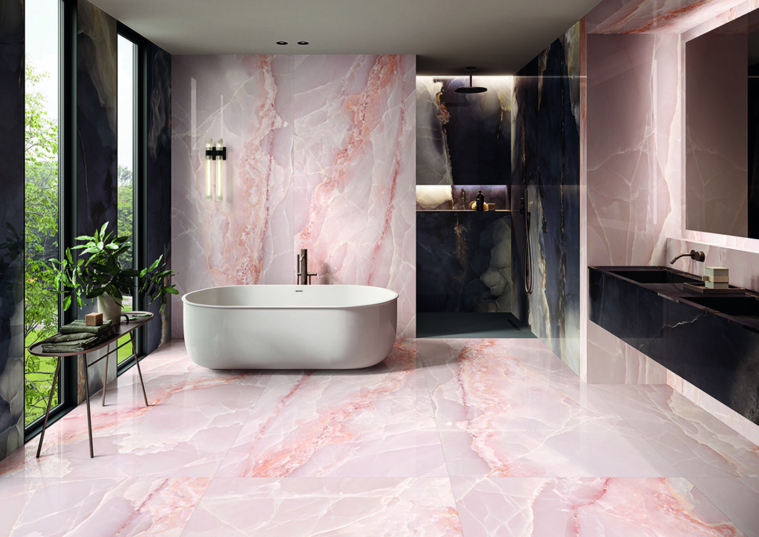 This bathroom showcases the new Onyx Pink Tiles with black in the wet room to create a striking finish.
