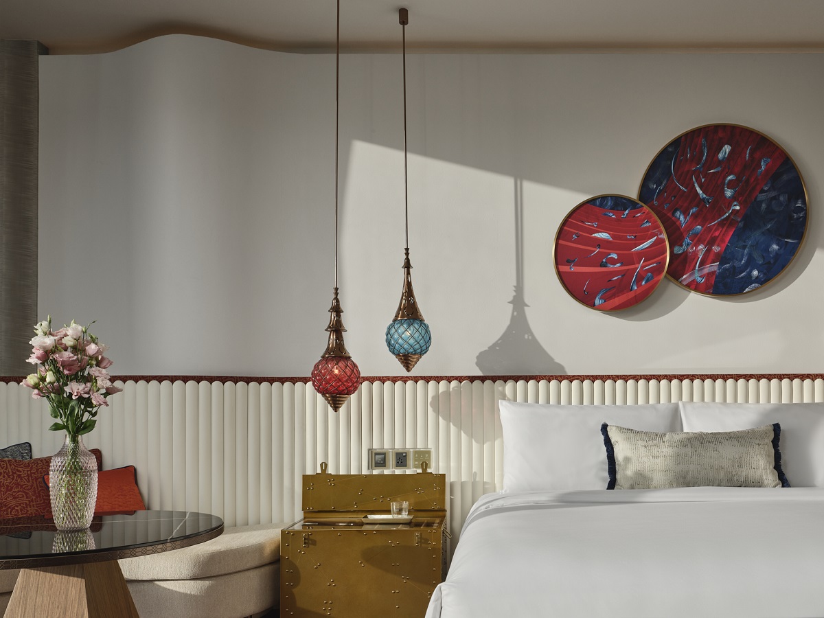 guestroom at W Dubai with coloured glass lighting inspired by traditional design