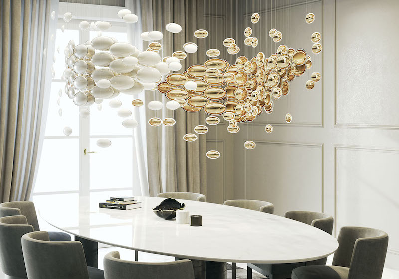 An innovative lighting piece, above a table, by Sans Souci