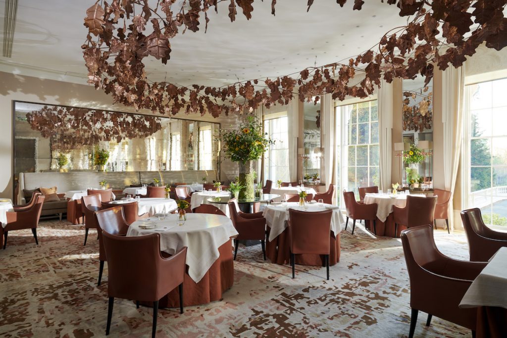 Coworth Park restaurant with leaves on the ceiling