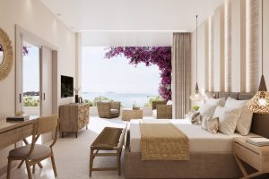 bungalow suite at Ikos Odisia with a riot of bouganvilla framing the seaview