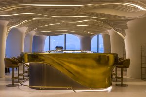 curved gold bar and sculptural ceiling designed by Elastic for Isla Brown Corinthia