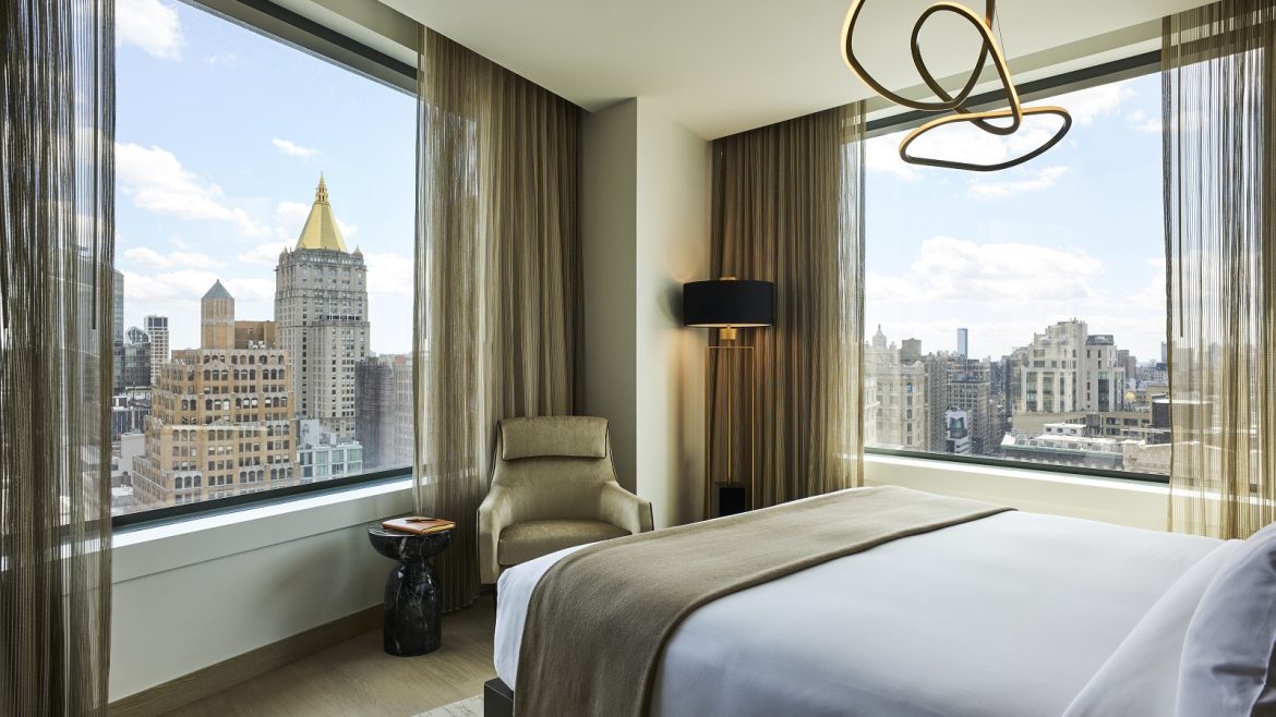 Madison suite guestroom in the Ritz Carlton New York NoMad with views over Manhattan
