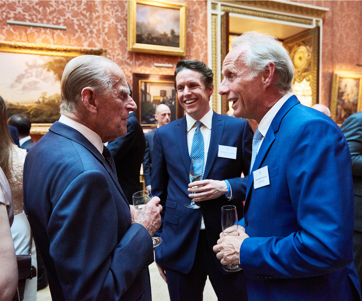 Image credit: William and Robert Chelsom meeting the late HRH Prince Phillip when Chelsom awarded the Queen's Award. | Image credit: Chelsom