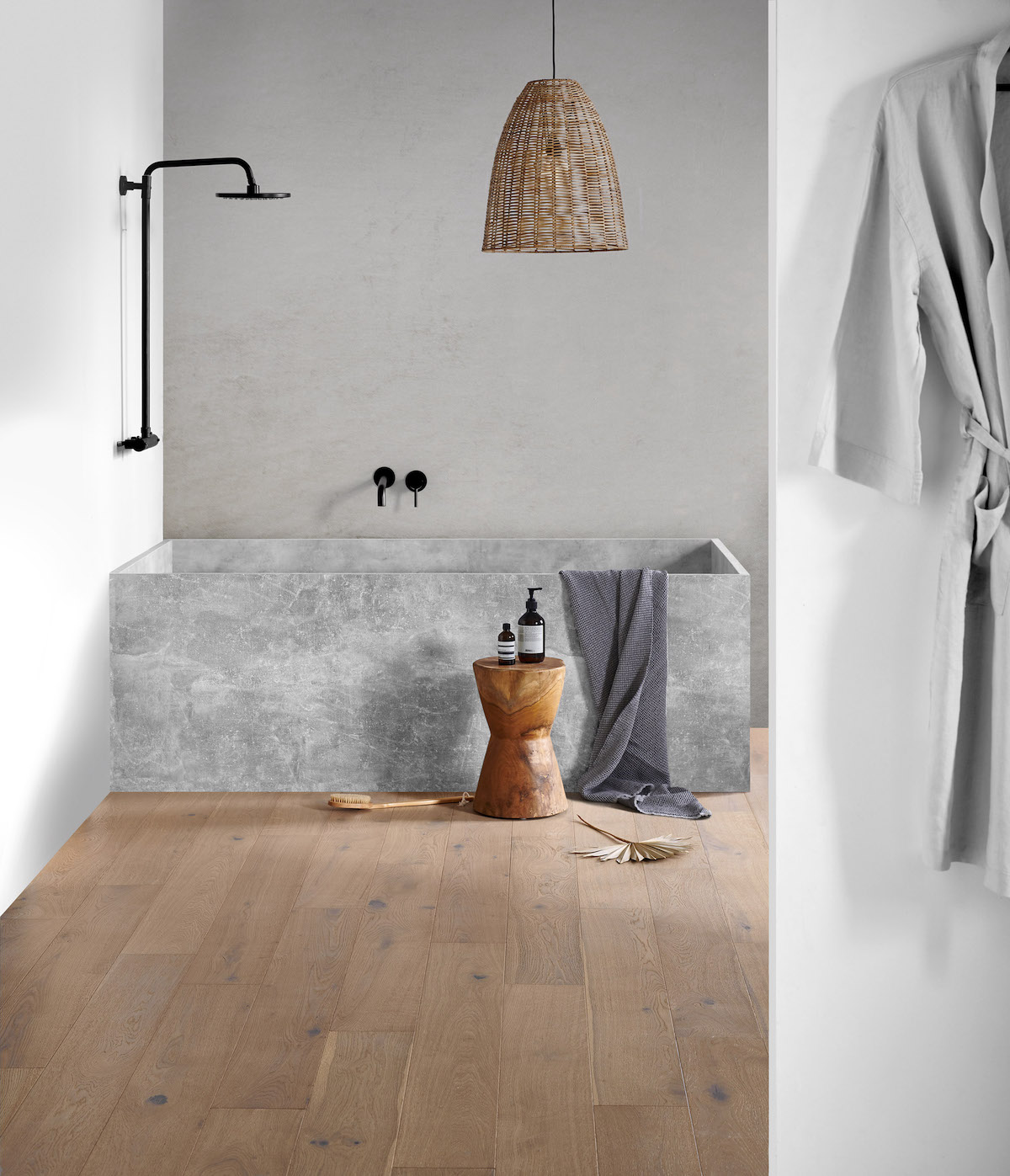 Image caption: Featuring a real wood top layer, this bathroom flooring, our Woodpecker Lynton in Seagrass Oak from the Stratex collection, features a waterproof finish. | Image credit: Hyperion Tiles