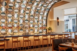 curved feature wall behind the bar in Zaytinya restaurant in Ritz Carlton New York