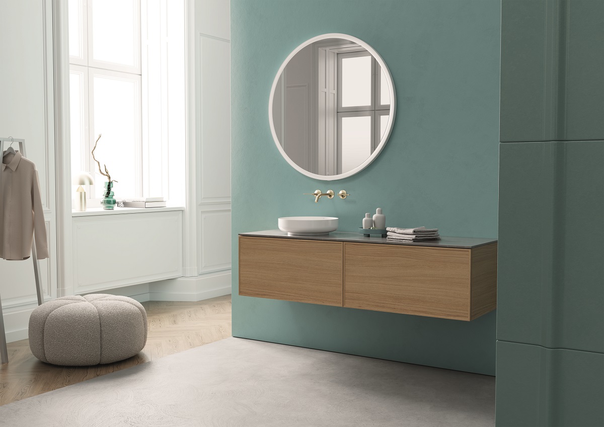 wood finish furniture in blue bathroom with fittings by Alape Arkta from Dornbracht