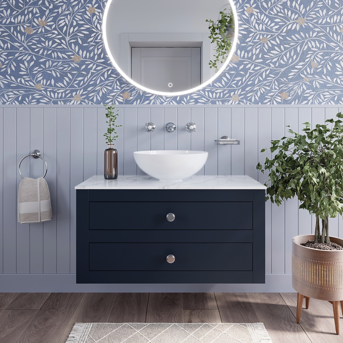Indigo Blue Crosswater Canvass bathroom furniture on light blue wall below a round mirror