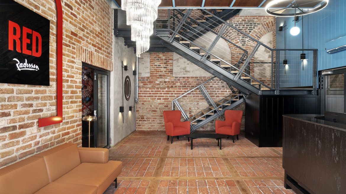brick walls and metal stairs loft style decor at Radisson RED Gdansk