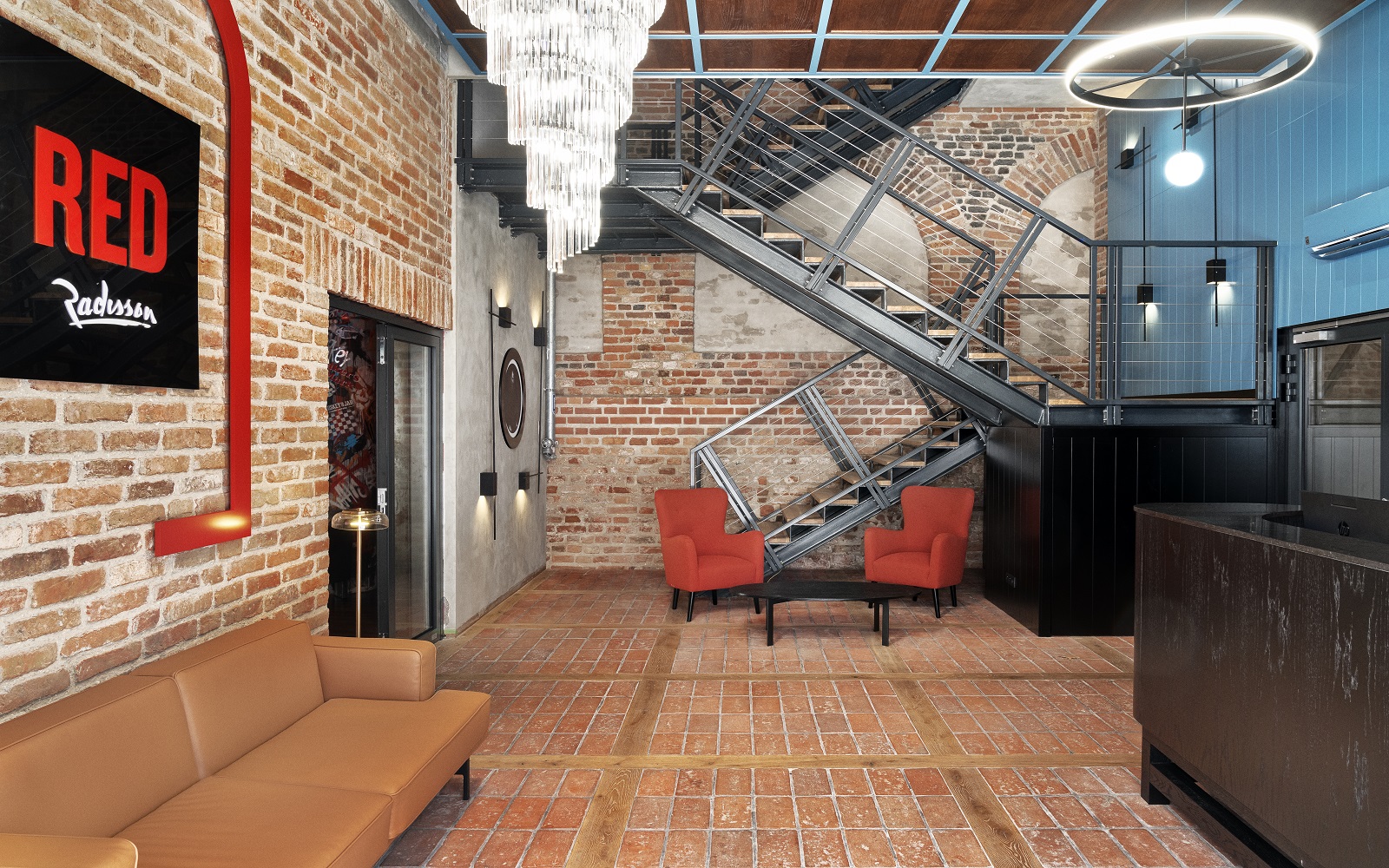 brick walls and metal stairs loft style decor at Radisson RED Gdansk
