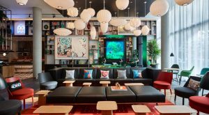 lobby at citizenM Miami Brickell with seating and lighting installation