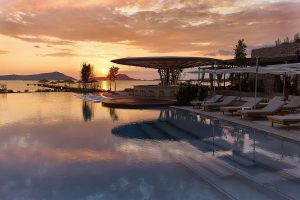 sunset over the pool at the WET deck at W Costa Navarino