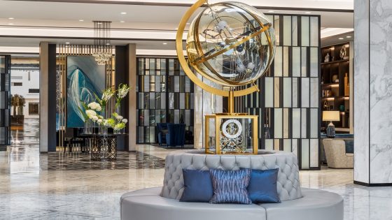Waldorf Astoria Kuwait lobby with central sculptural clock feature