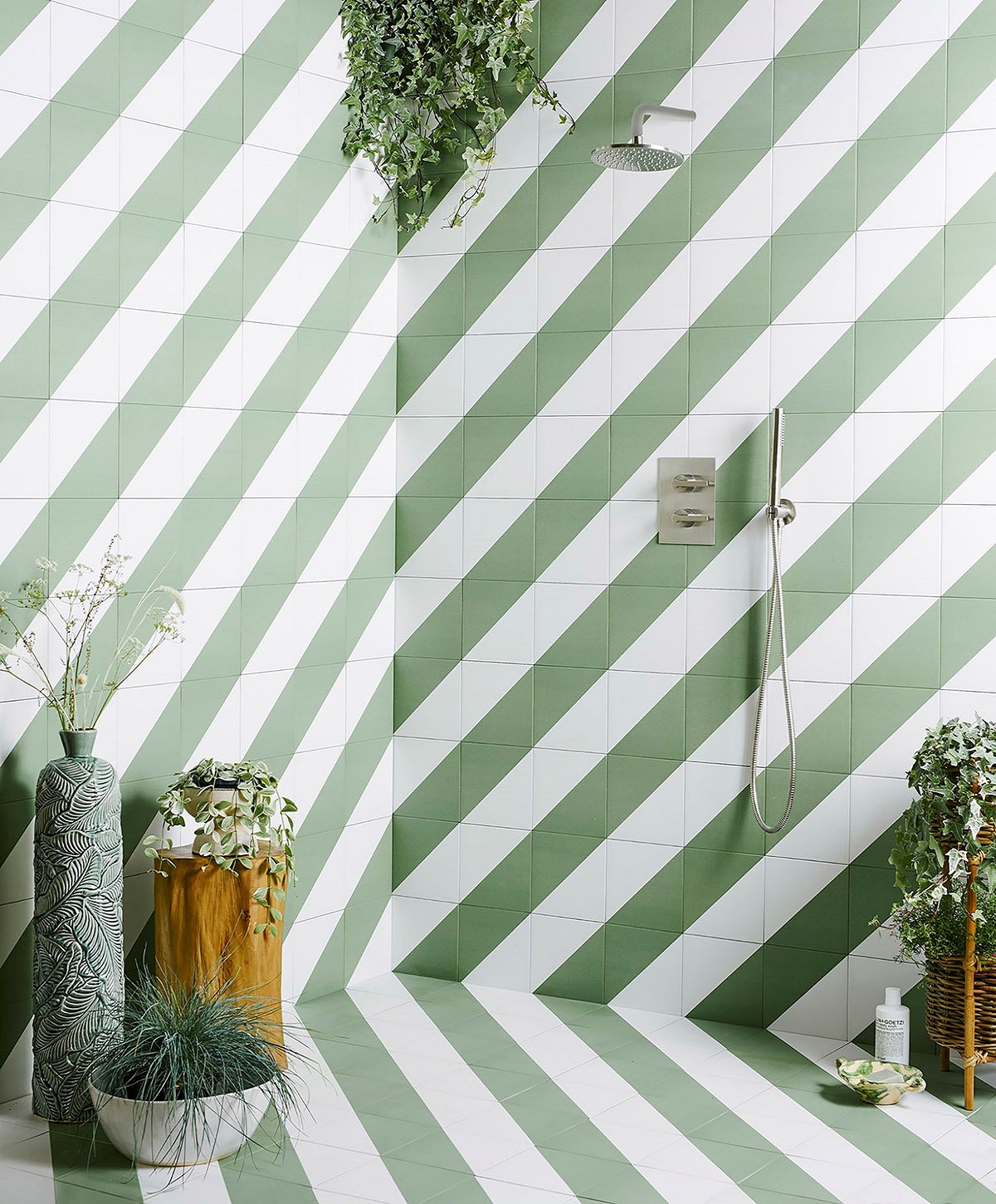 bold mint green and white tiled stripes in a wetroom using Green Alalpardo porcelain tiles by Bert & May for Hyperion tiles