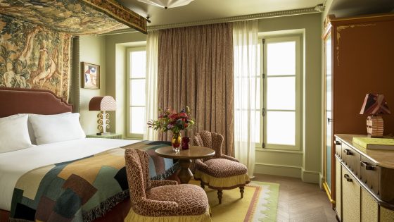 A luxury hotel guestroom Maisons Pariente’s flamboyant Parisian