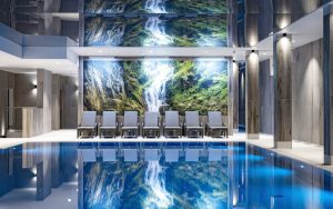 focus waterfall wallpaper design wallcovering by Newmor in hotel swimming pool area